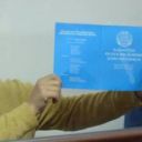 max_bokayev_holding_constitution_and_talgat_ayan-iloveimg-resized-1482128910